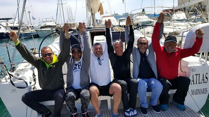 A crew celebrating together after finishing their course in Marmaris